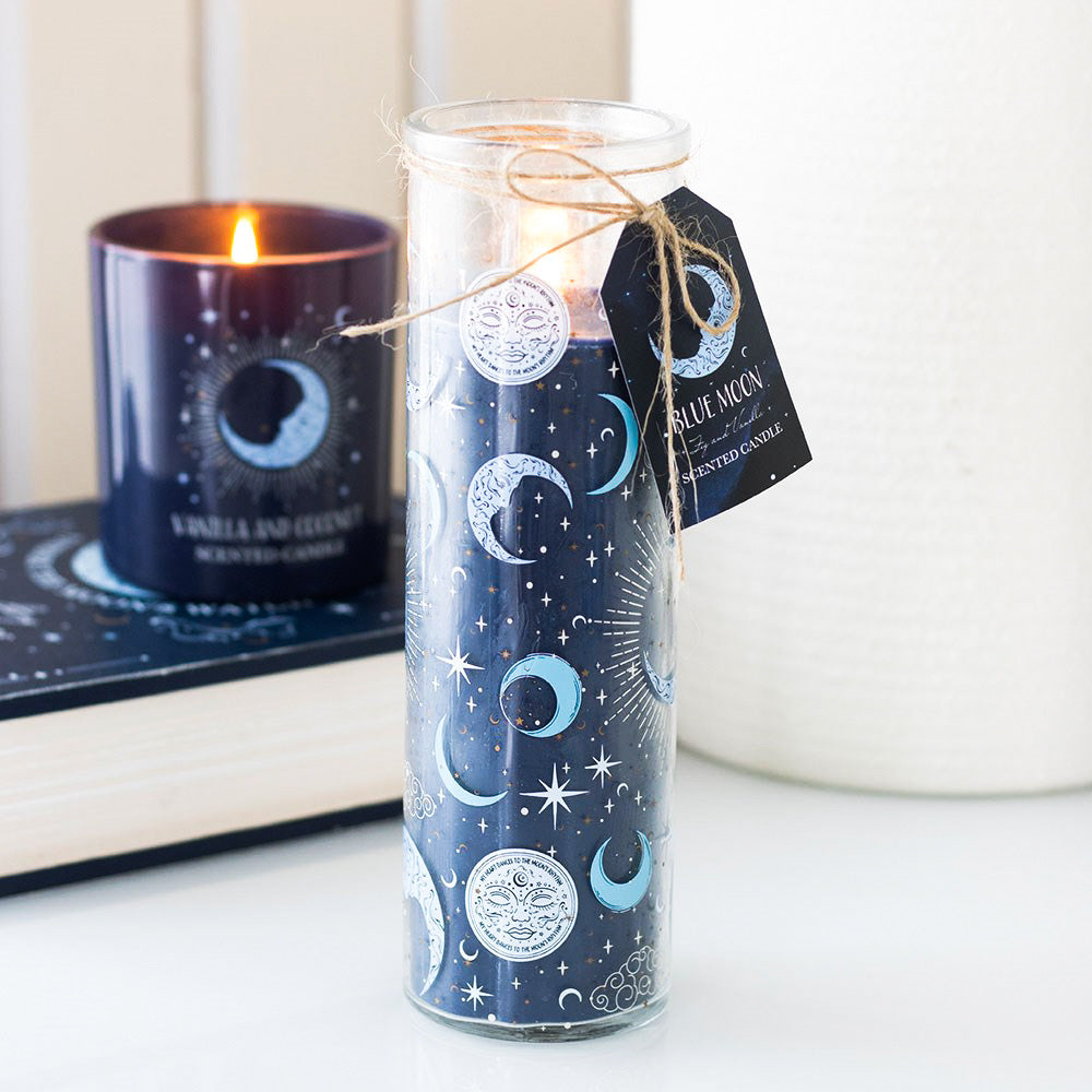Blue Celestial Moon and Star Candle with candle in the background.