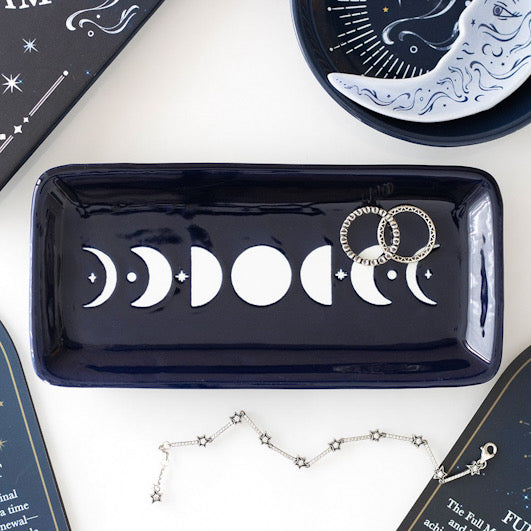 Blue Moon Phase Trinket Dish on white table surrounded by jewellery.