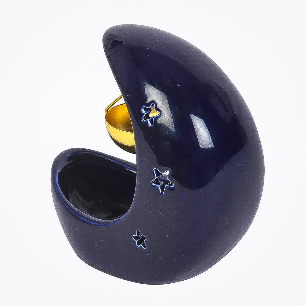 Navy blue moon-shaped container with star designs on a white background