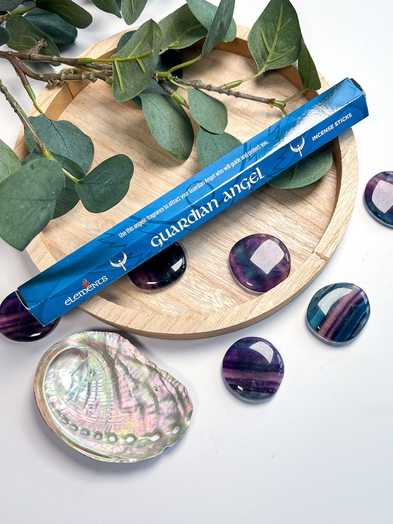 Elements Guardian Angel incense on wooden tray with crystals