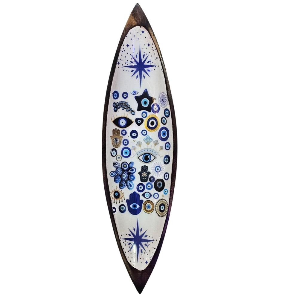 Decorative incense stick holder with eye and star patterns on a white background