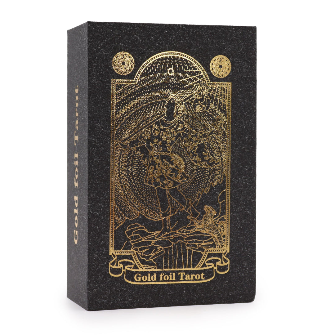 Black tarot card box with gold foil design and text on a white background