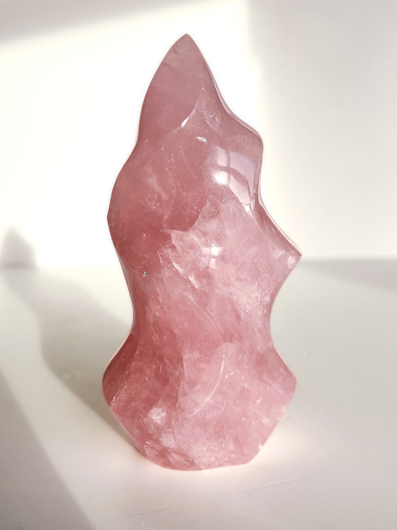Rose Quartz Flame with white background.